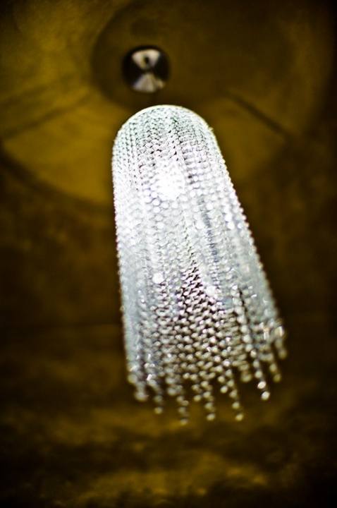 Cascading crystal chandelier seen from below